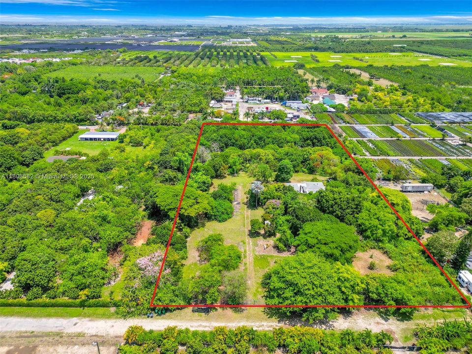 APPROX. 5 ACRE STREET TO STREET W/ HOME BEAUTIFUL FLOWERING TREE'S, FRUIT TREE'S. FORMER NURSERY BUSINESS W/ INFRASTRUCTUTRE.