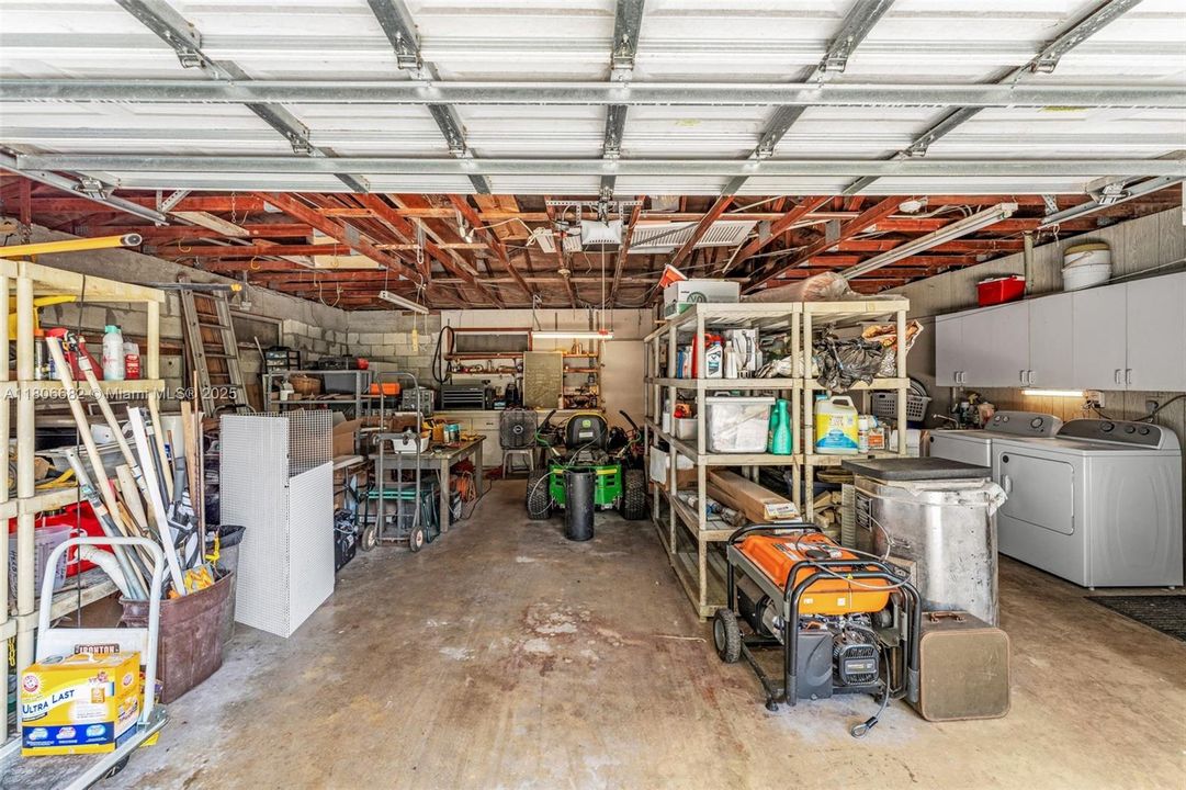 HURRICANE PROOF GARAGE DOOR. BATHROOM IN REAR. IS A GENERATOR READY HOME. SOME EQUIPMENT INCLUDED.