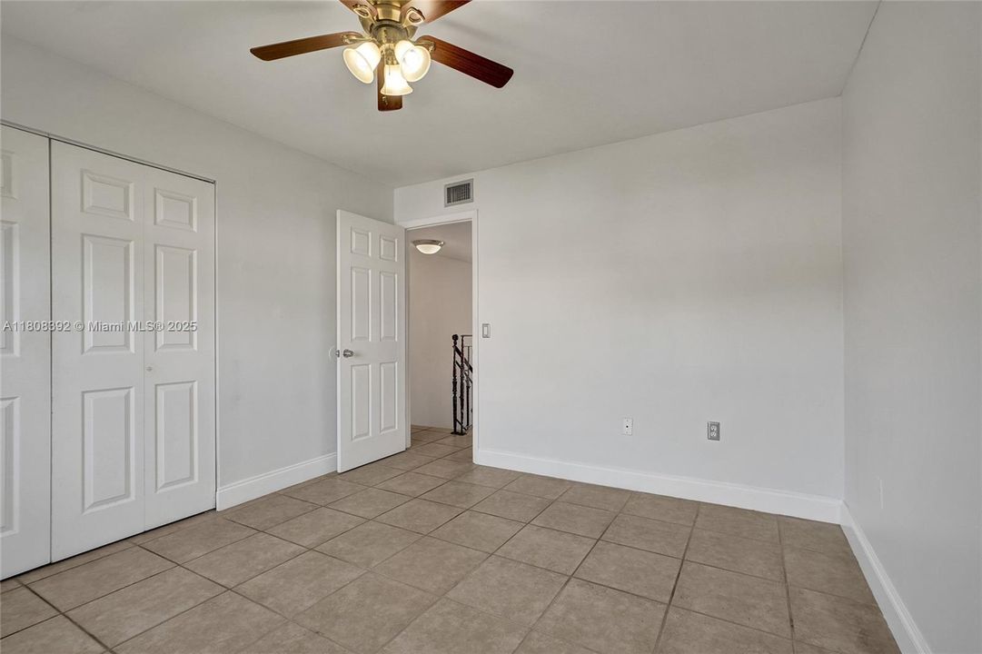 Bedroom #1 has easy access to the stairs and the large bathroom with separate dressing area.