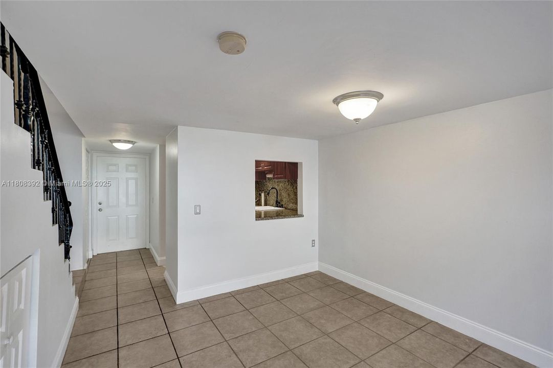 Large dining room adjoins spacious living room.