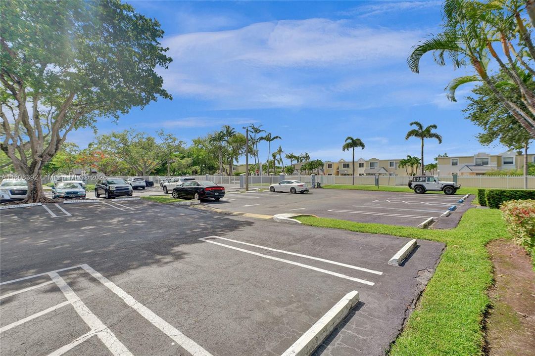 Parking lot 2 of 2 - notice all the spaces and how meticulously maintained the grounds are.