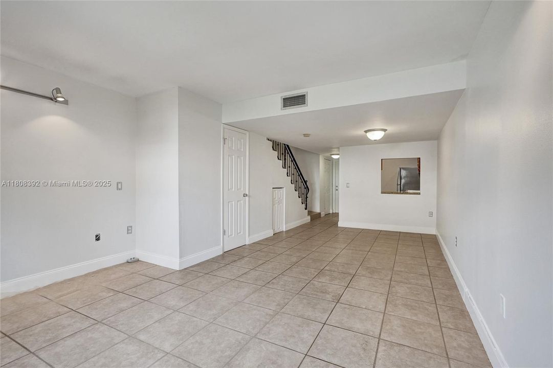 Big screen TV? Notice how much wall space this lrg living room provides.