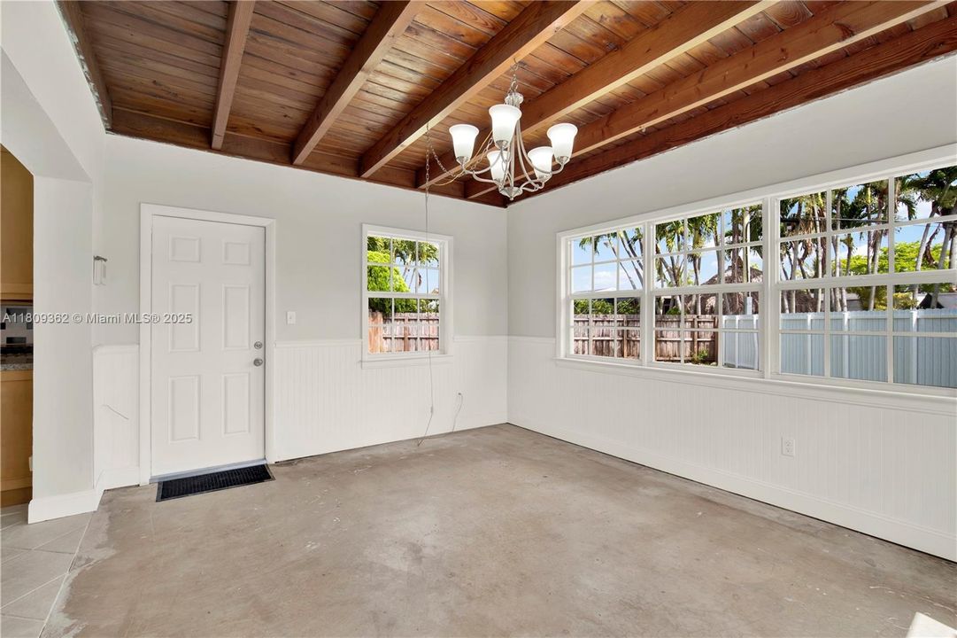 The family room has access to the backyard