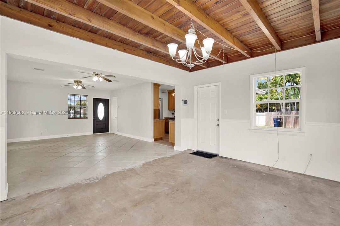 Family room with the lovely tongue & groove Florida pine ceilings.
