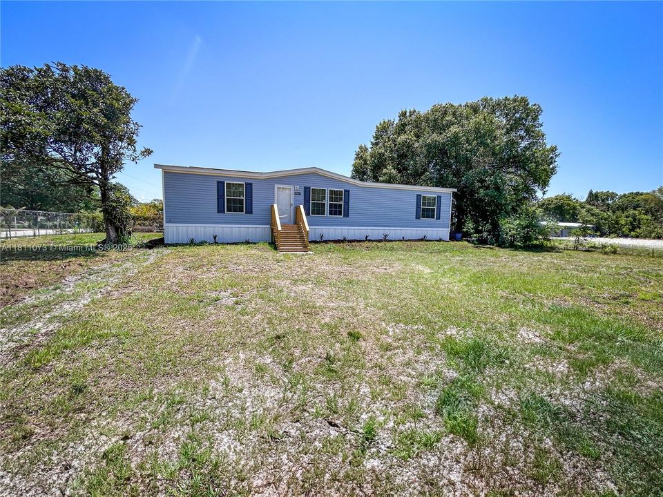 Front of house and yard