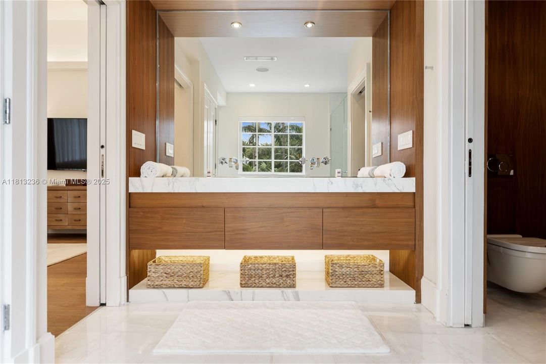 Custom Wood Cabinets meet Double Marble Sink
