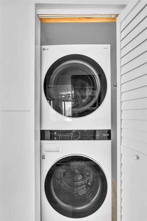 Stacked LG ThinQ Smart Washer & Driver