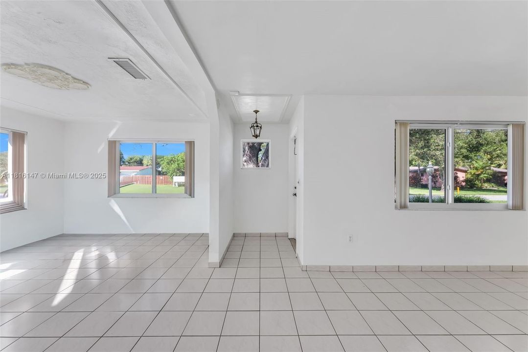 Foyer entry and living room