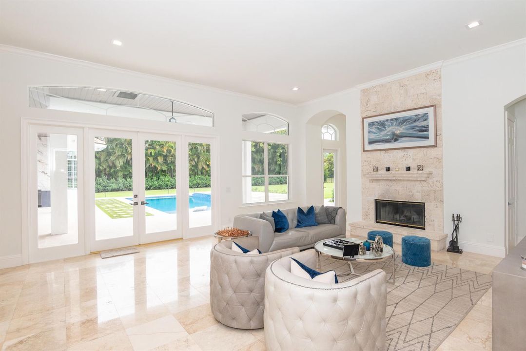 Family Room with Fireplace and Pool