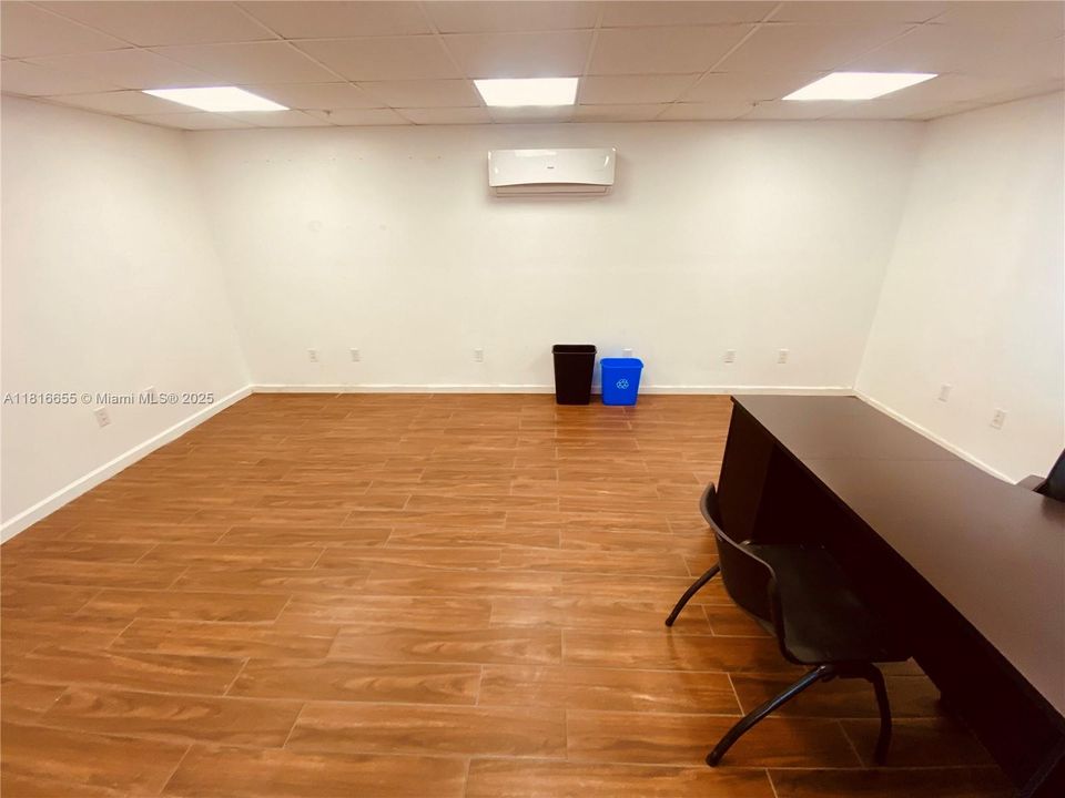 Vacant Class C office for lease within landlord's Miami River warehouse