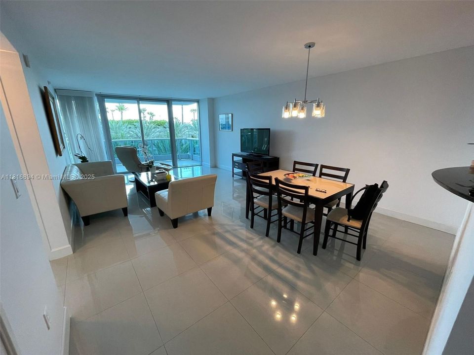 living/dining areas with  view to terrace