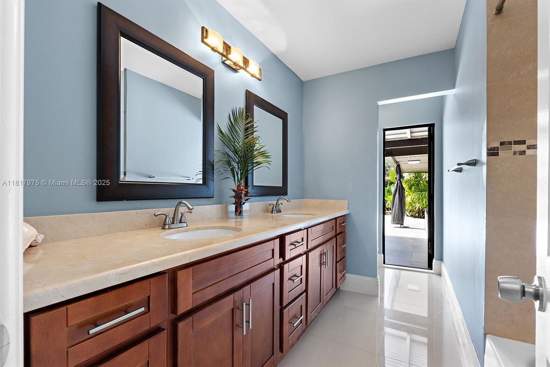 shared bathroom with pool access