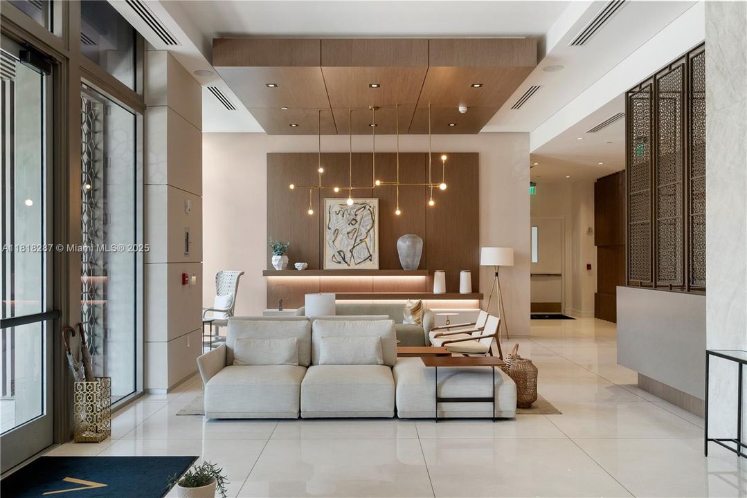 Inviting lounge space with plush sofas and modern decor, perfect for casual meetings or quiet relaxation.