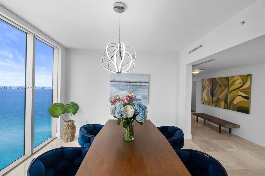 This area is being utilized for a formal dining room but can be used for whatever you need in your home in the sky. Need an office? Why not one with a view.  There is plenty of room to add a closet to create a guest room.