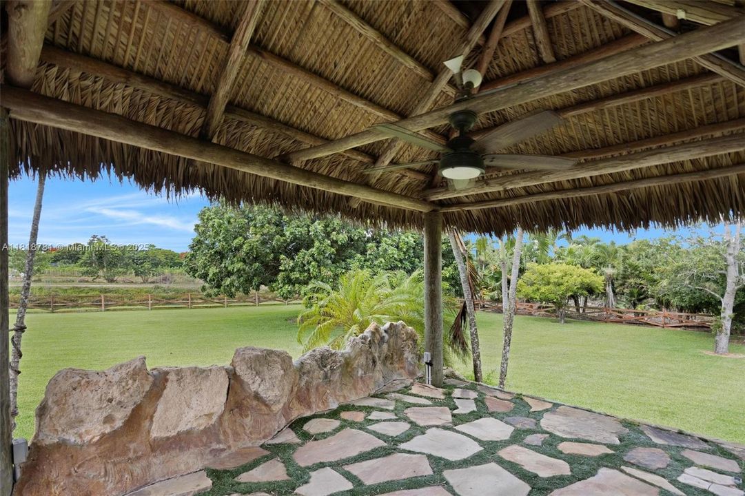 Chickee hut to built in pool slide and water fall