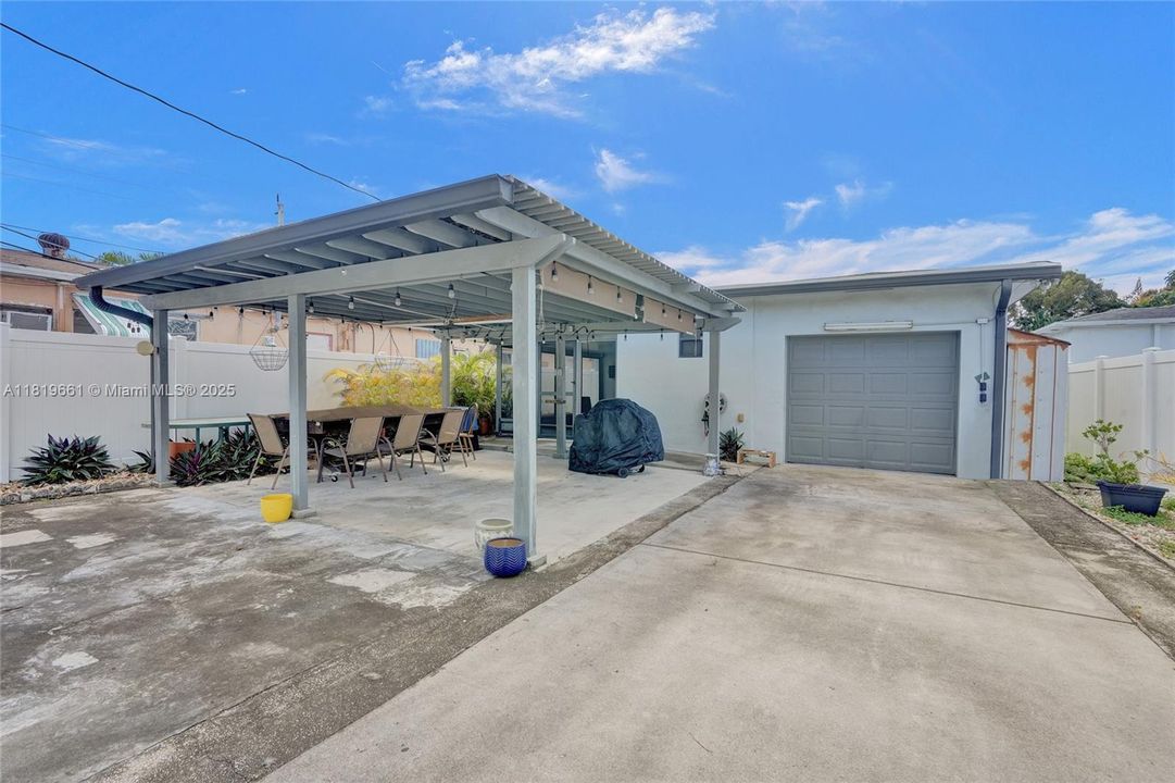 Fully fenced in back yard with Garage entrance, Patio area, room Parking an RV, Boat or Other toys, even room for a pool