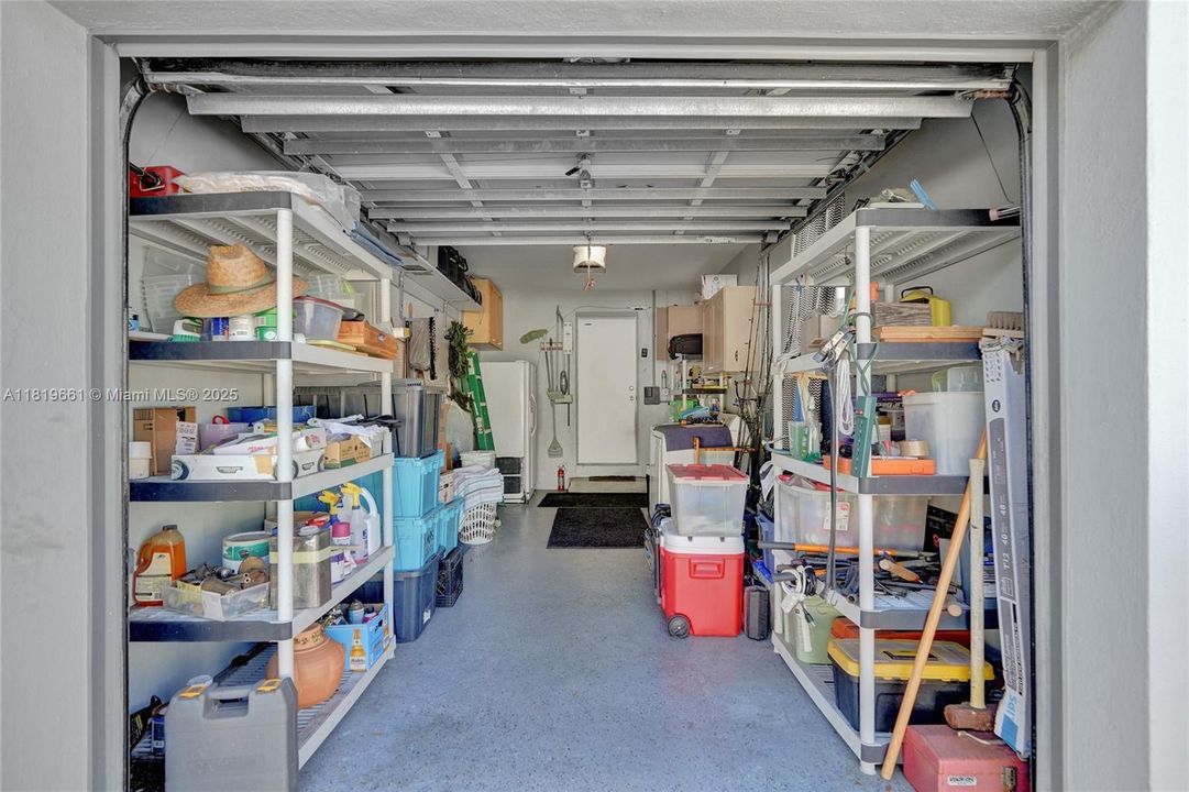 1 Car Garage with Laundry room and extra fridge