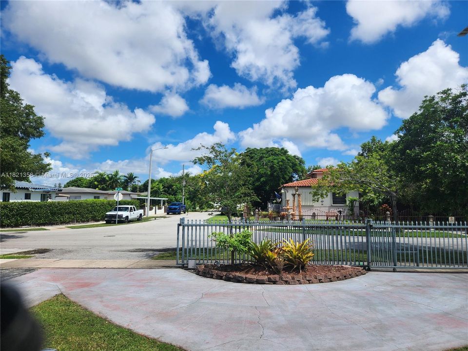 View from front door to street, electric gates lots of parking tree lined streets paved sidewalks !