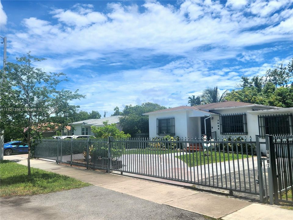 Treelined streets welcome you home private electric gates into paved driveway street parking also!