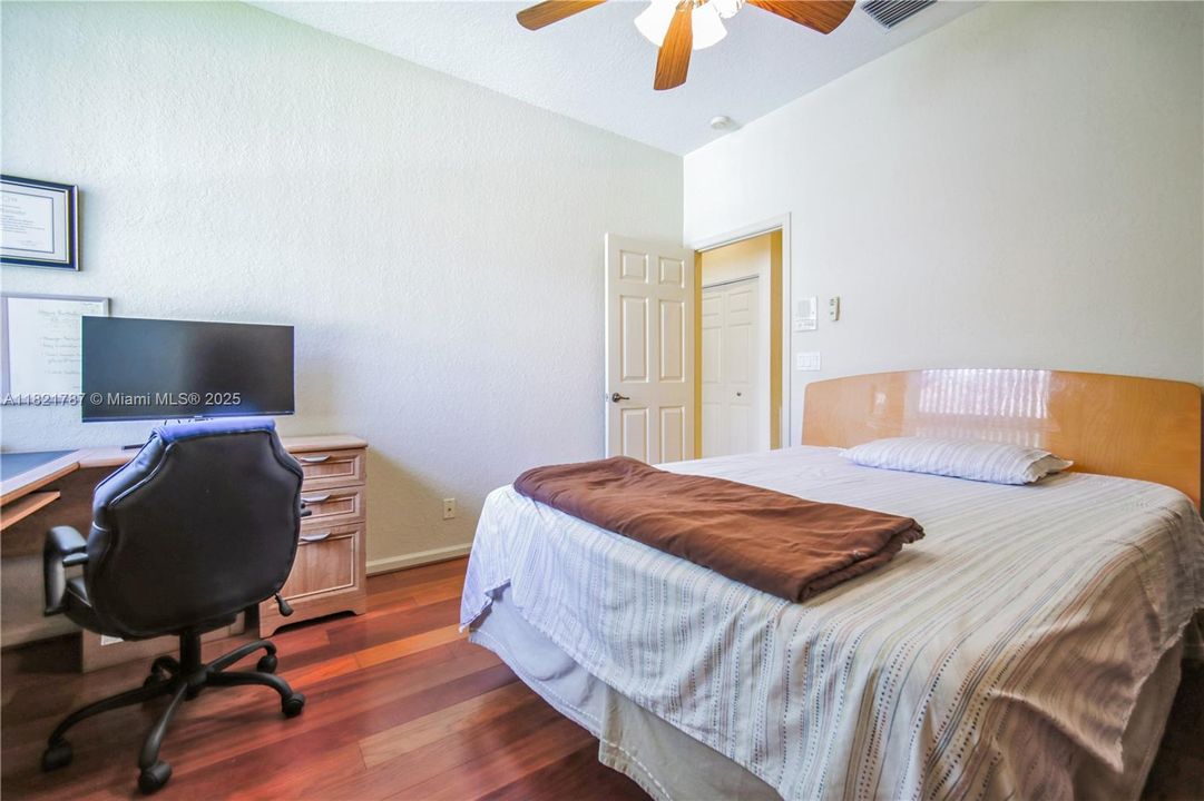 Great size bedroom with beautiful wood floors & custom blinds on window.