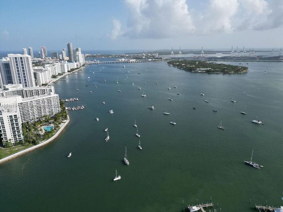 Spectacular bay and city views from this Miami Beach high-rise — waterfront living at its finest.
