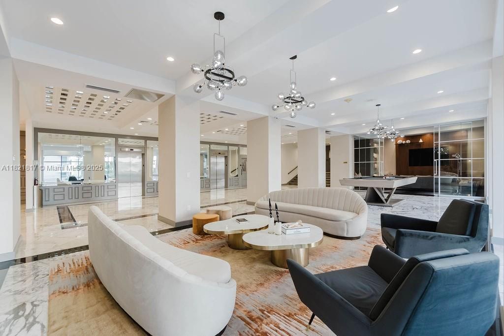 Spacious lobby lounge for residents and guests — upscale living with comfort and style.