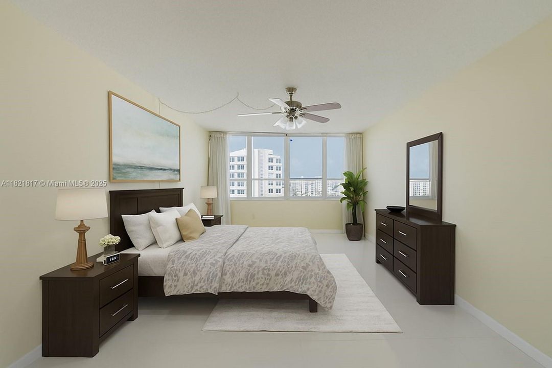 Elegant primary bedroom with water views, large windows, and space for a king bed — a serene Miami Beach retreat.