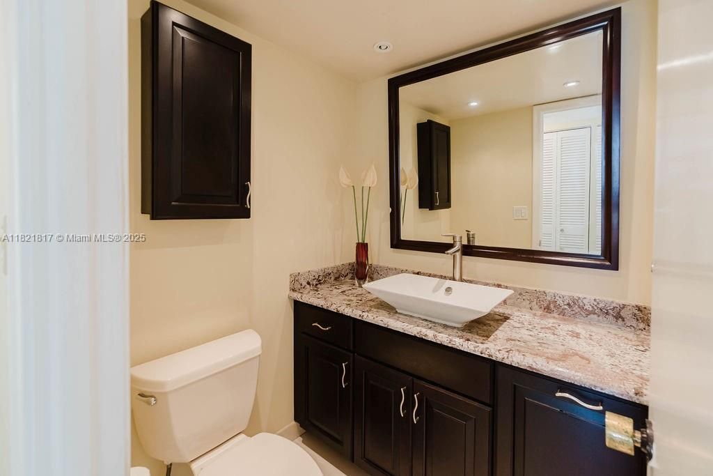 Contemporary second bathroom with modern fixtures and neutral tones — stylish and functional design.
