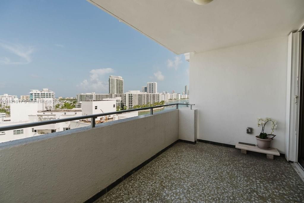 Balcony view showcasing Biscayne Bay and Miami skyline — enjoy breathtaking sunsets and ocean breezes.