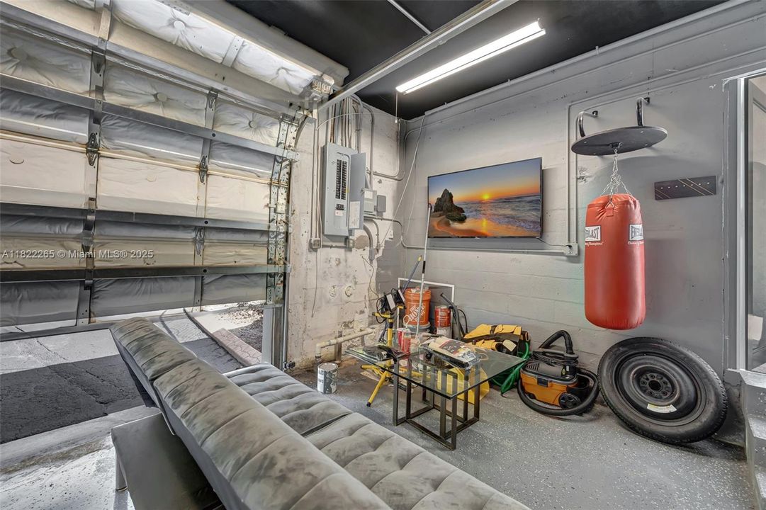 Air Conditioned Garage with Couch, TV & Gym