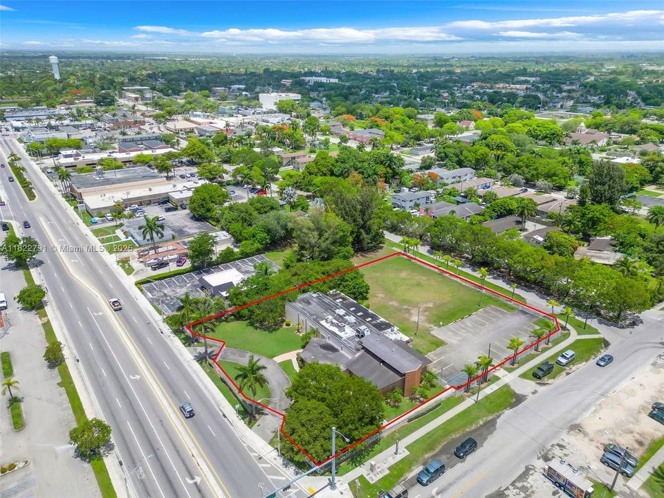 1.38 ACRES ZONED B-1 W/ 7640 SQ.FT. BUILDING FLOOD ZONE X ON 2 MAIN ROADS. CAMPBELL DR aka NE 8TH STREET AND 1st AVE. BLOCK TO BLOCK. LOTS OF GREENSPACE SOLD BELOW MARKET AS-IS.