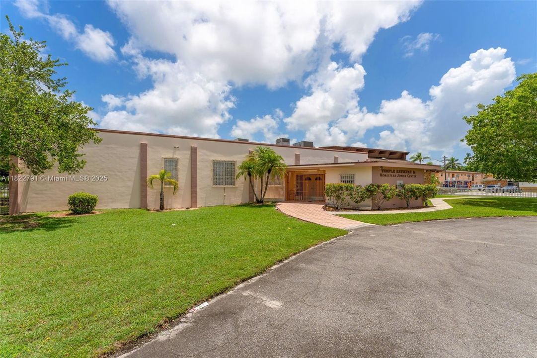 DBL ENTRY INTO FOYER/.CHAPEL TO EAST RECEPTION AREA TO WEST WITH KITCHEN AND ADDITIONAL ROOMS TO THE NORTH...ACCESS TO KITCHEN FROM EXTERIOR PARKING AREA