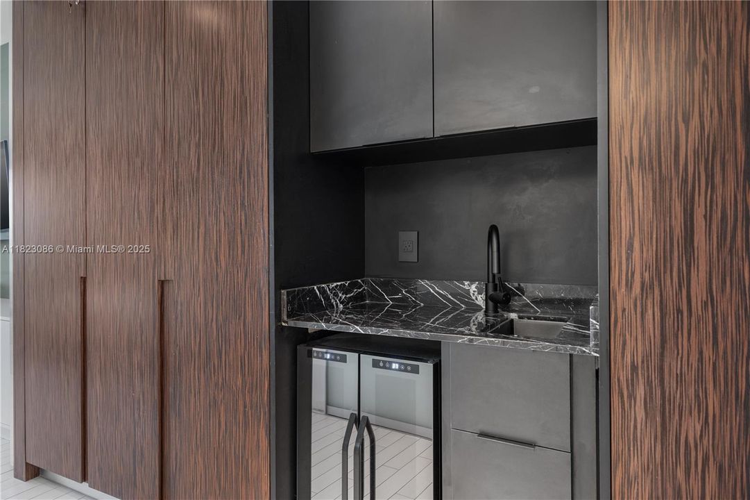 Microwave, sink, dishes.