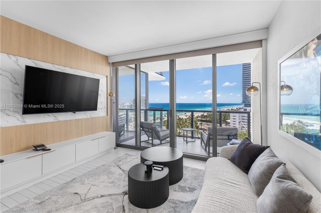 Living room area with Tv.