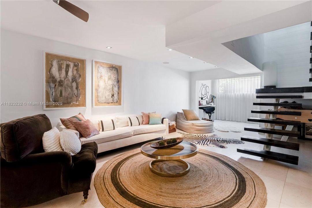 This is bonus space on the first floor - with it's own en-suite full bathroom and closet - perfect for in laws or guest