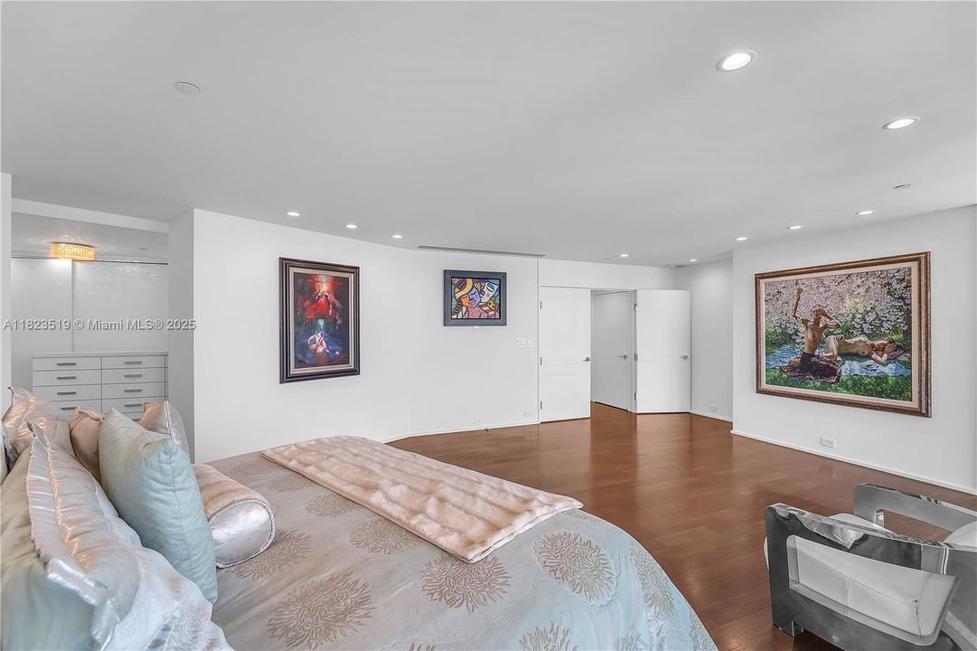 Expansive View across mast bedroom.  Facing wall permits plasma TV.