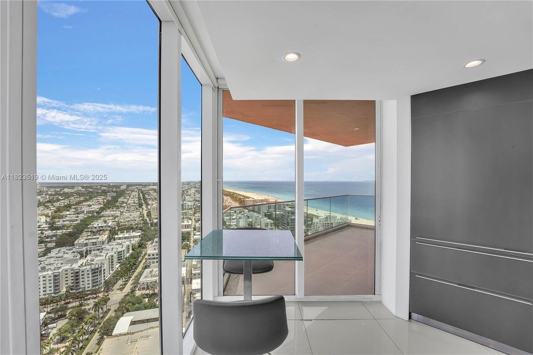 View of breakfast nook seating, views and proximity to balcony shown. Amazing views to sip coffee to.