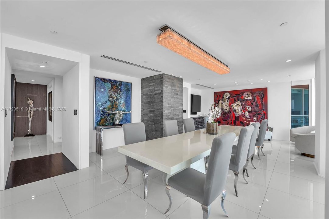 Dining area designed w service alcove for wine service, bar or art. Can add cocktail tables in bay window alcoves when needed.