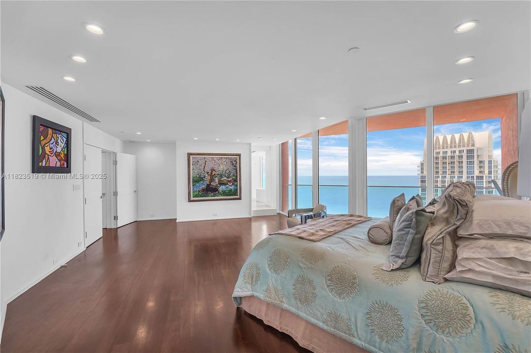 Plenty of space for a sitting area or cabinetry.  Private bathroom adjoining this room.