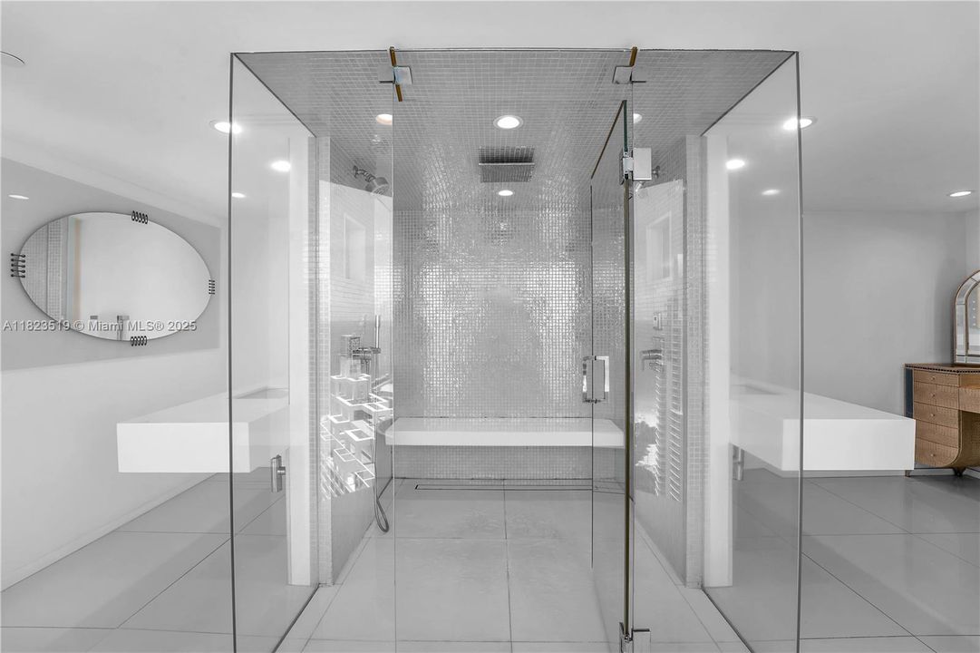 Master Bathroom.  Dual sinks.  Hot steam shower w sitting bench for relaxation.