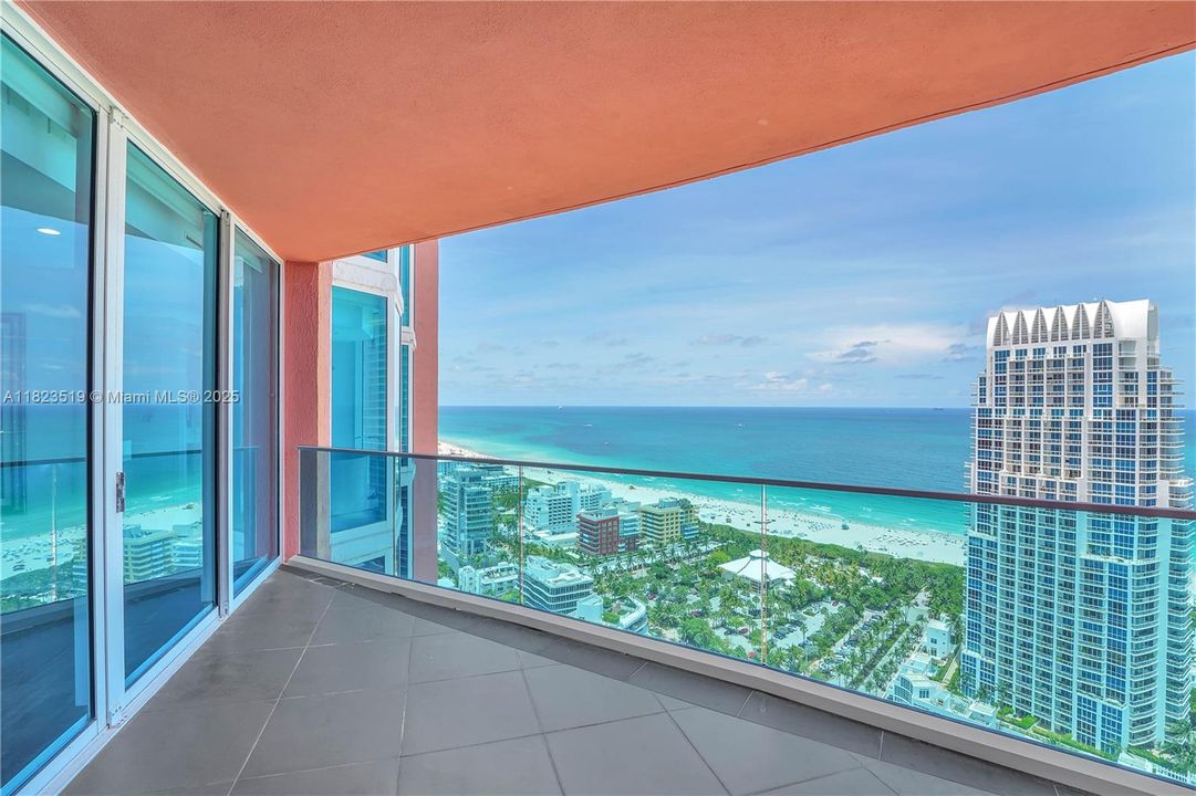 Private Balcony #3 of 4 adjacent to Master bedroom.  Views are East and NE towards Nikki Beach and ocean.