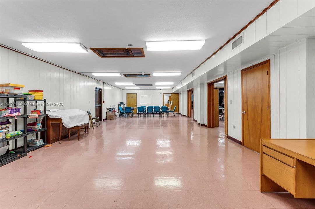 private room/ storage off reception are w. accordion doors to add additional space to room or privacy