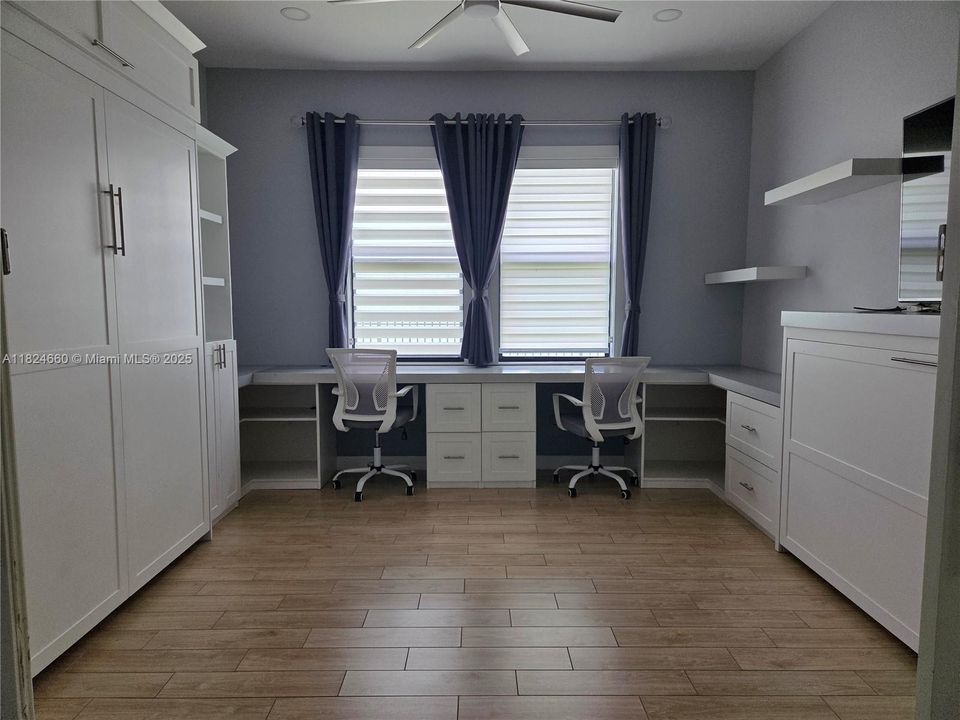 Family room,Murphy beds and two desks.