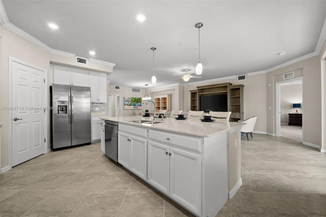 Spacious kitchen with Island keeps the cook part of gatherings