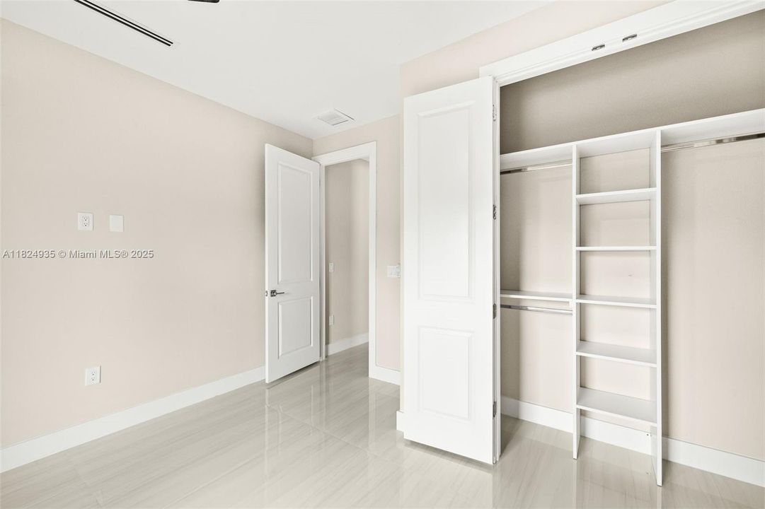Bedroom 4 (large closet with built in shelves)