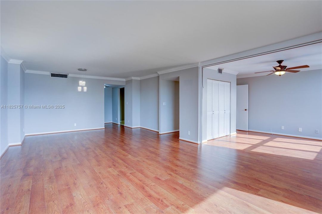 Expansive Dining room and living room that opens into Den or second bedroom