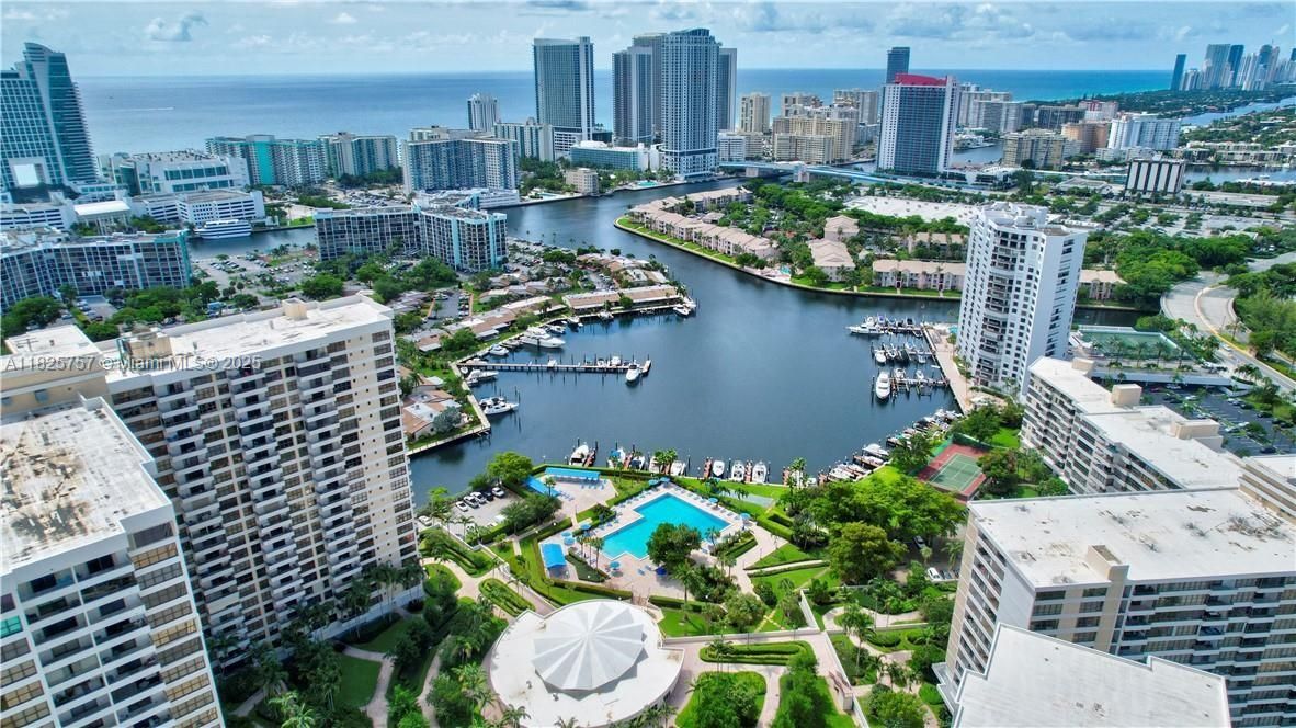 STUNNING LUXURY COMPLEX WITH IMPECABLE LANDSCAPING, OVERSIZE POOL ON THE INTRACOASTAL WATERWAY WITH GORGEOUS VIEWS