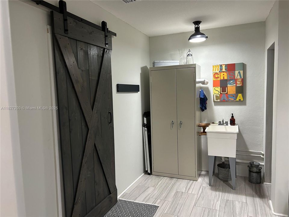 Fully equipped laundry room.