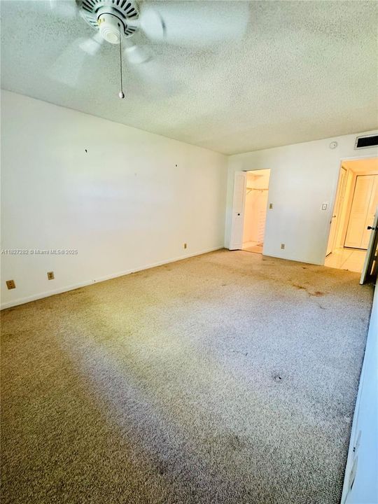 Bedroom facing closet/entry