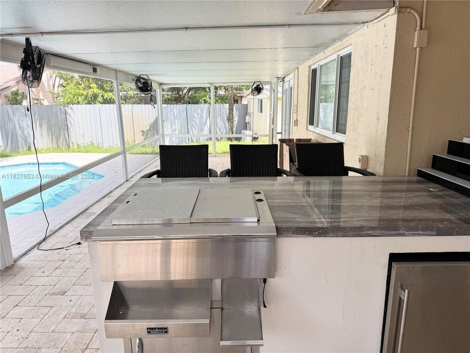 large patio with bar